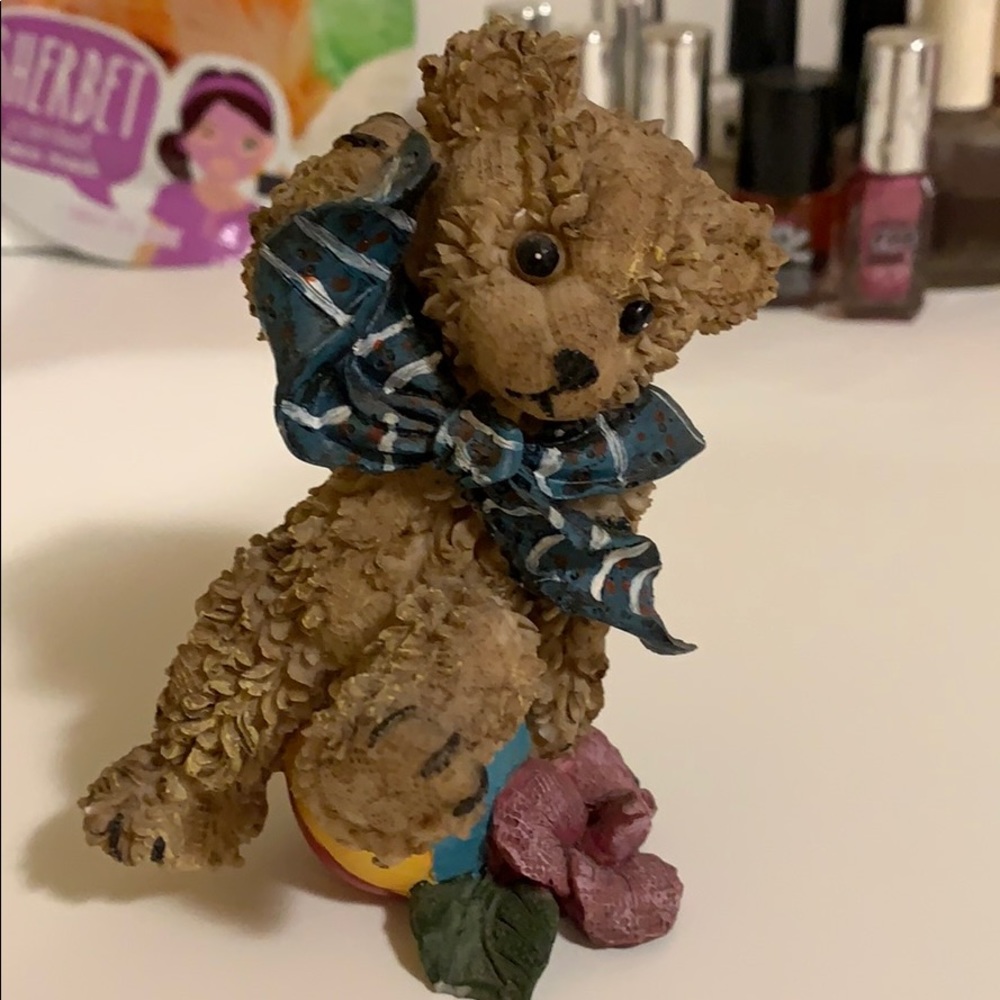 Cute bear on ball antique figure